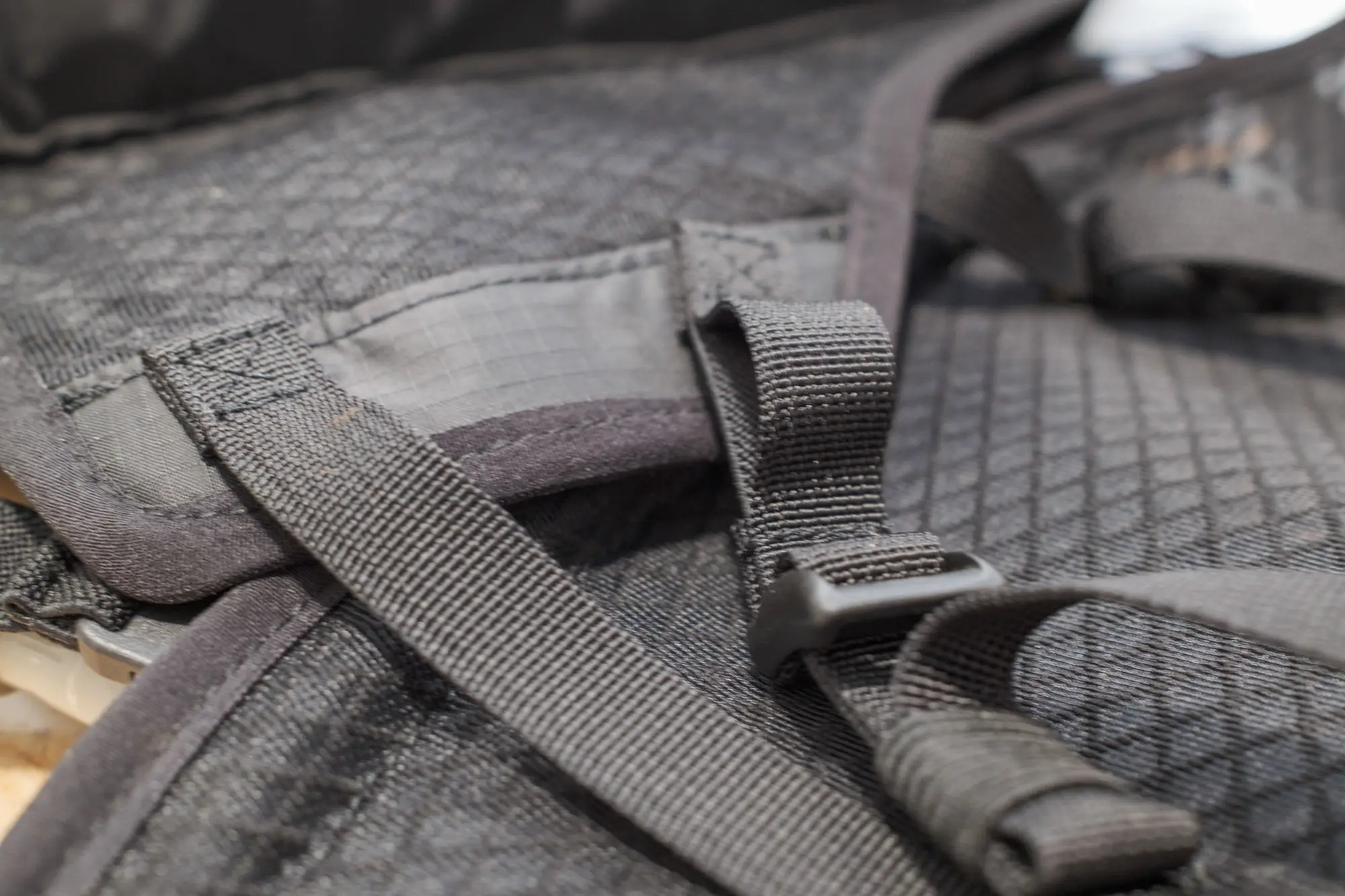 Apidura Racing Hydration Vest buckle detail.