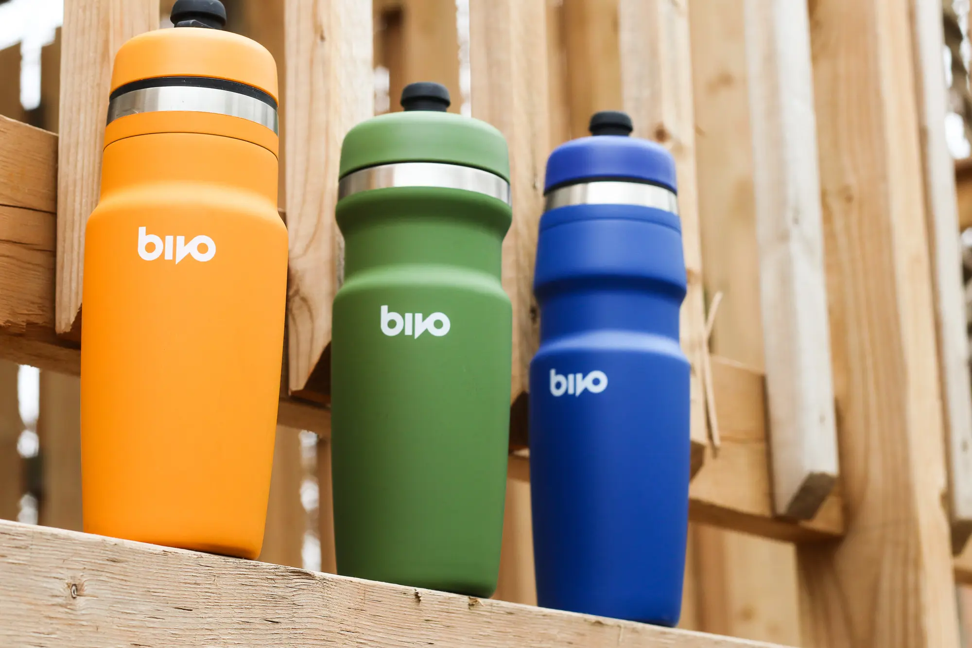 Three water bottles lined up.