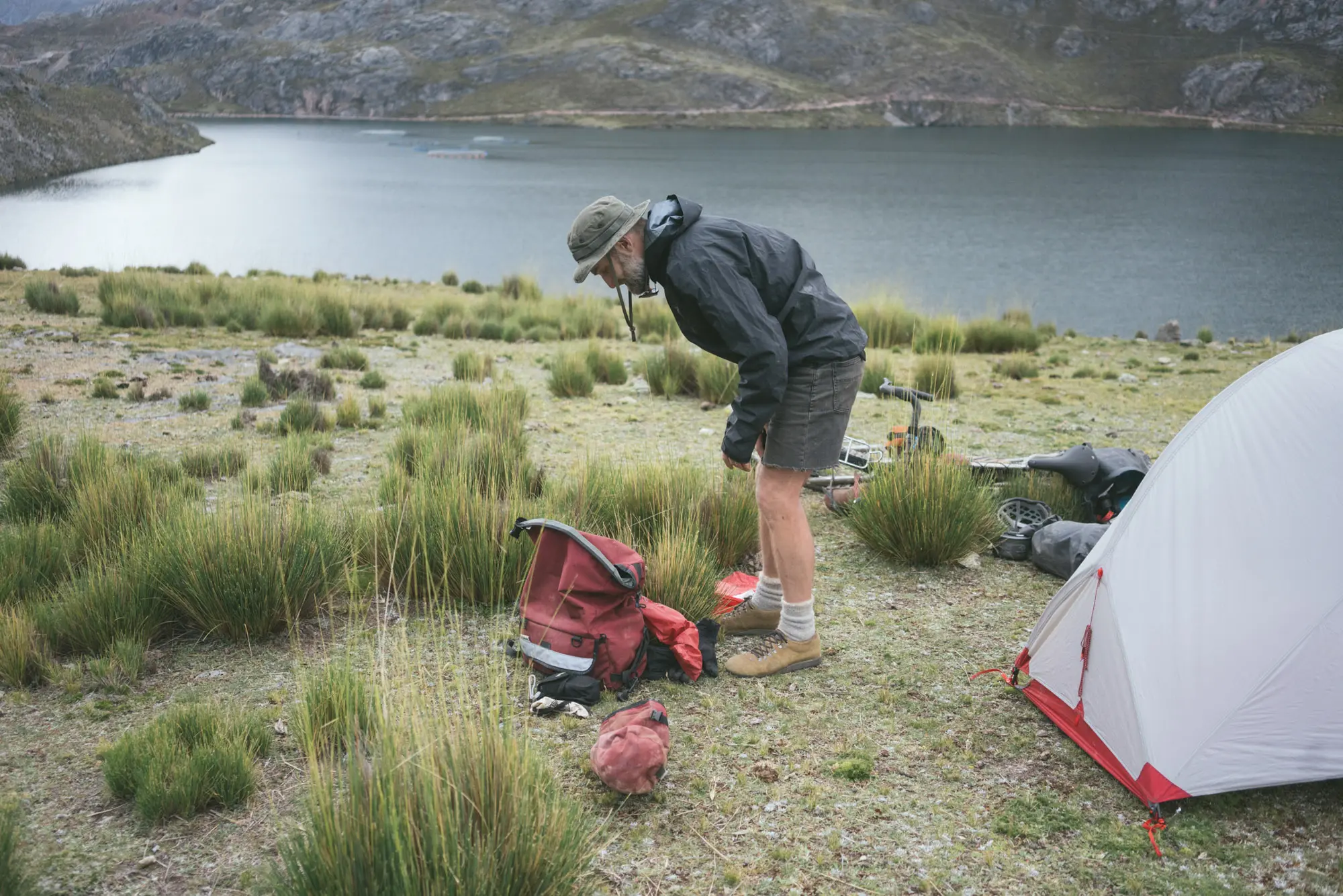 Tom in front an Andean lake.