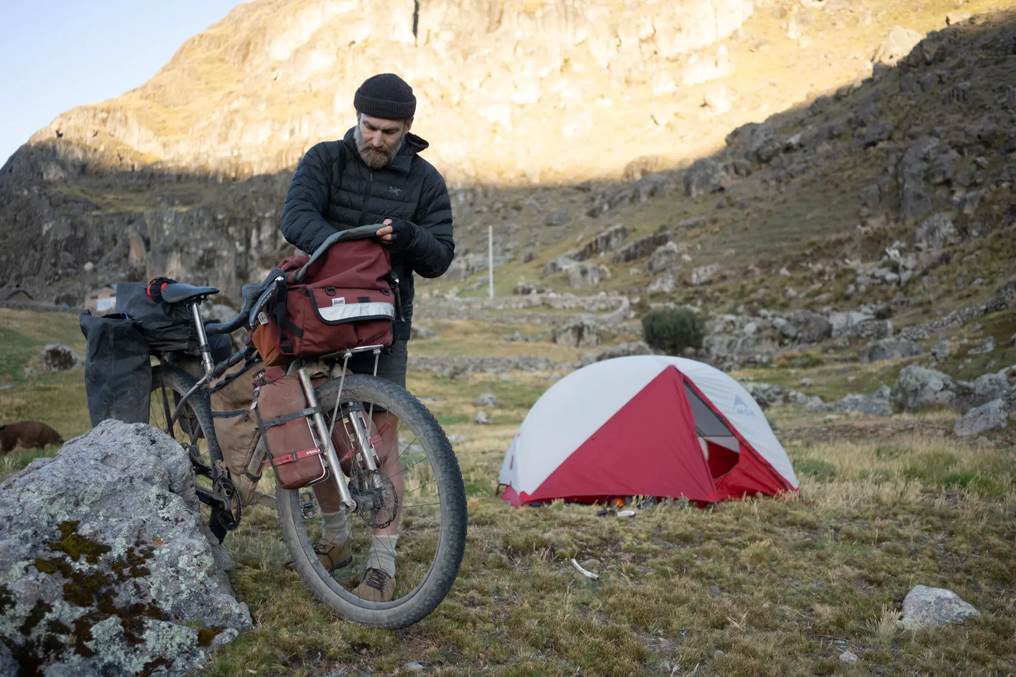 Tom packs his Road Runner Bags and heads out of camp.